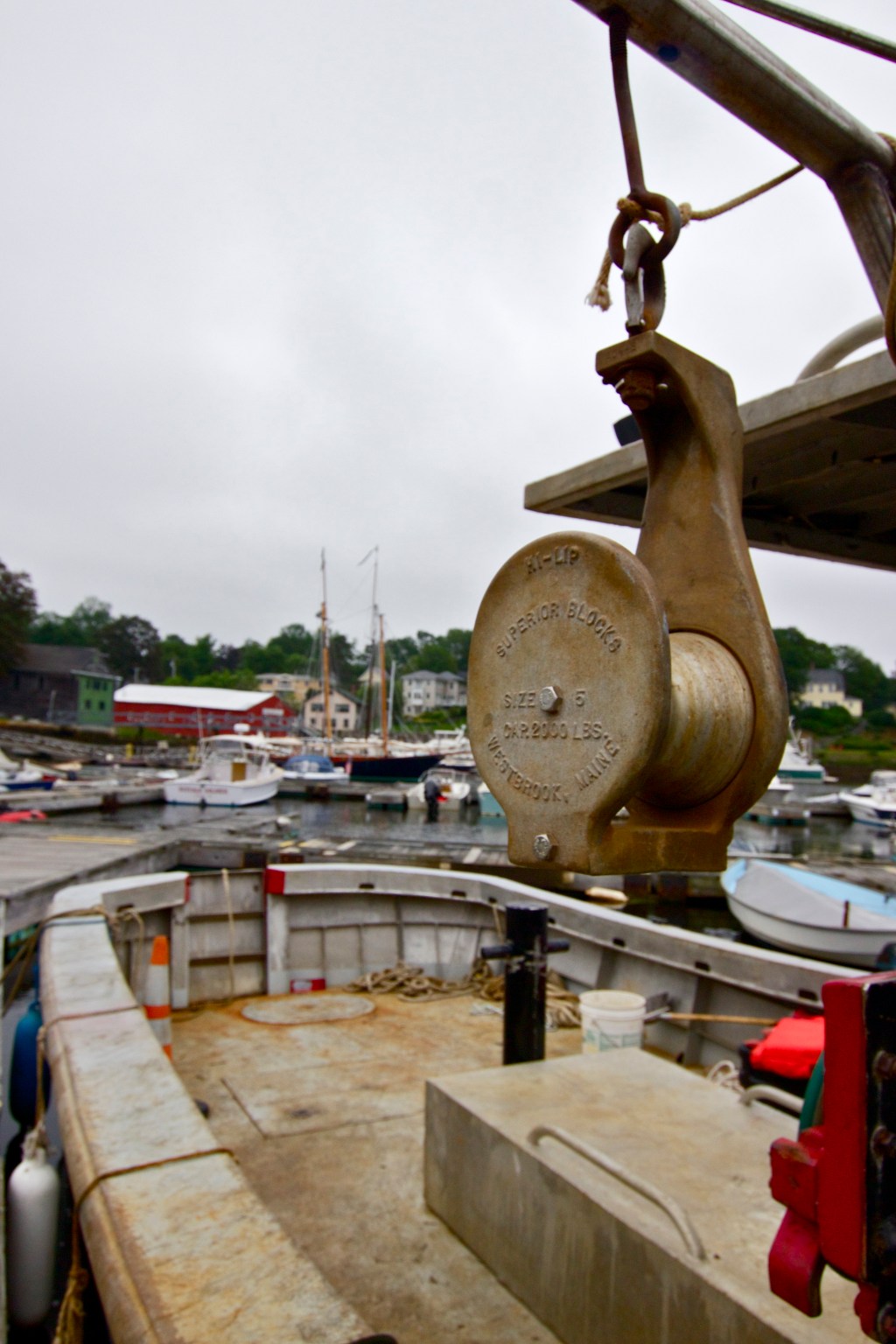 Spent some of the trip playing around with shot composition for my new wide-angle lens. Worked on getting soem nice DOF without distorting the edges with vignetting. Pic was taken on the floating walkways in Camden Harbor. Even though it was a cloudy early evening, there was almost no chance of pulling any detail out of the sky without completely under-exposing the pulley in the foreground :-/