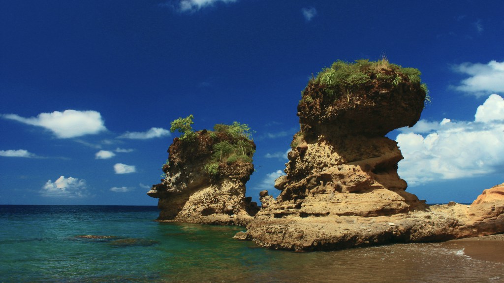 Geology buffs? I'll gladly add the technical name for these sweet, ocean-raked rock formations at the end of Anse Mamin in St. Lucia. Sigma 18mm, f/9, 1/125