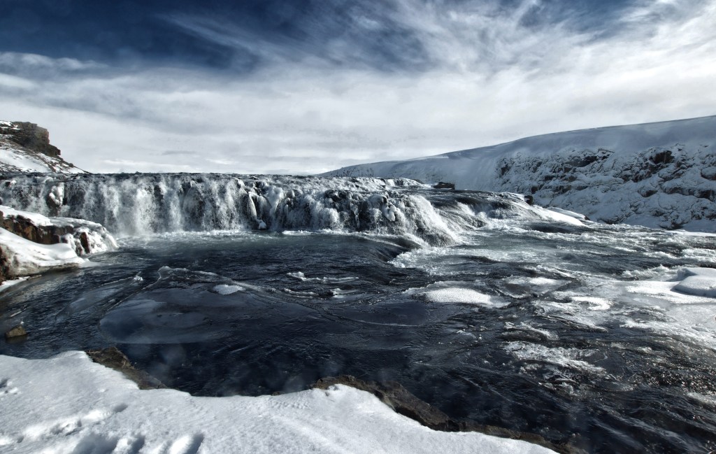 Iceland is great--no railings, fences, or confining signposts. Walk as you please--but please don't take a swim...View before a 105-foot drop. Sigma 10mm, ISO 100, f/10, 1/125