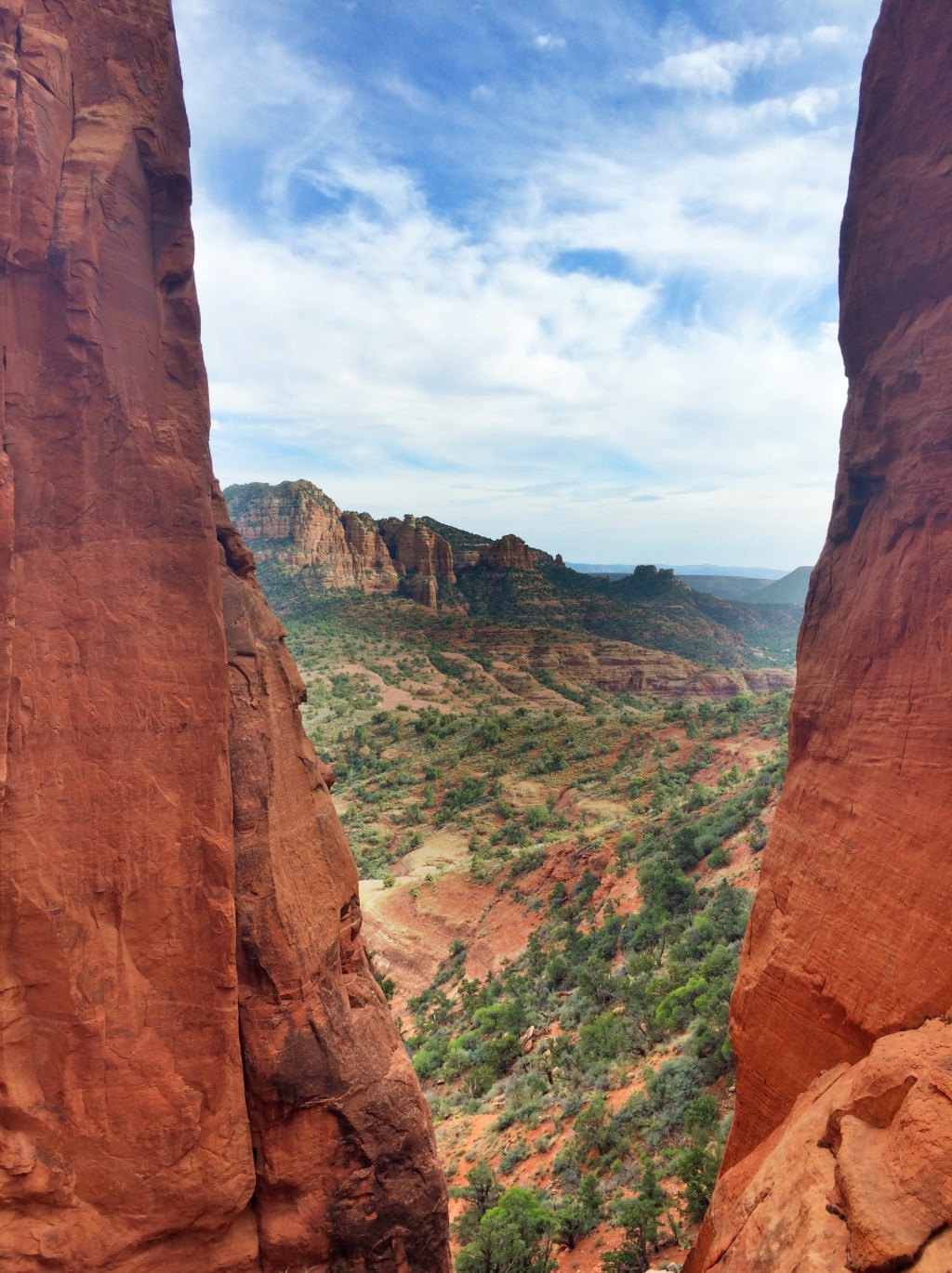 Looking through the Vortexes atop Cathedral Rock in Sedona, AZ. A good, shaded spot at the apex of the climb. I parked atop with a chocolate chip cookie from Wildflower Bread Company, shot a couple timelapses, and just enjoyed the awesome moment I was in :) iPhone 5s. Pro HDR App